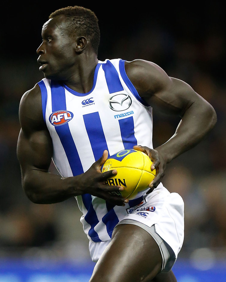 AFL 2015 Rd 23 - Richmond v North Melbourne MELBOURNE, AUSTRALIA - SEPTEMBER 4: Majak Daw of the Kangaroos in action during the 2015 AFL round 23 match between the Richmond Tigers and the North Melbourne Kangaroos at Etihad Stadium, Melbourne, Australia on September 4, 2015. (Photo by Adam Trafford/AFL Media)